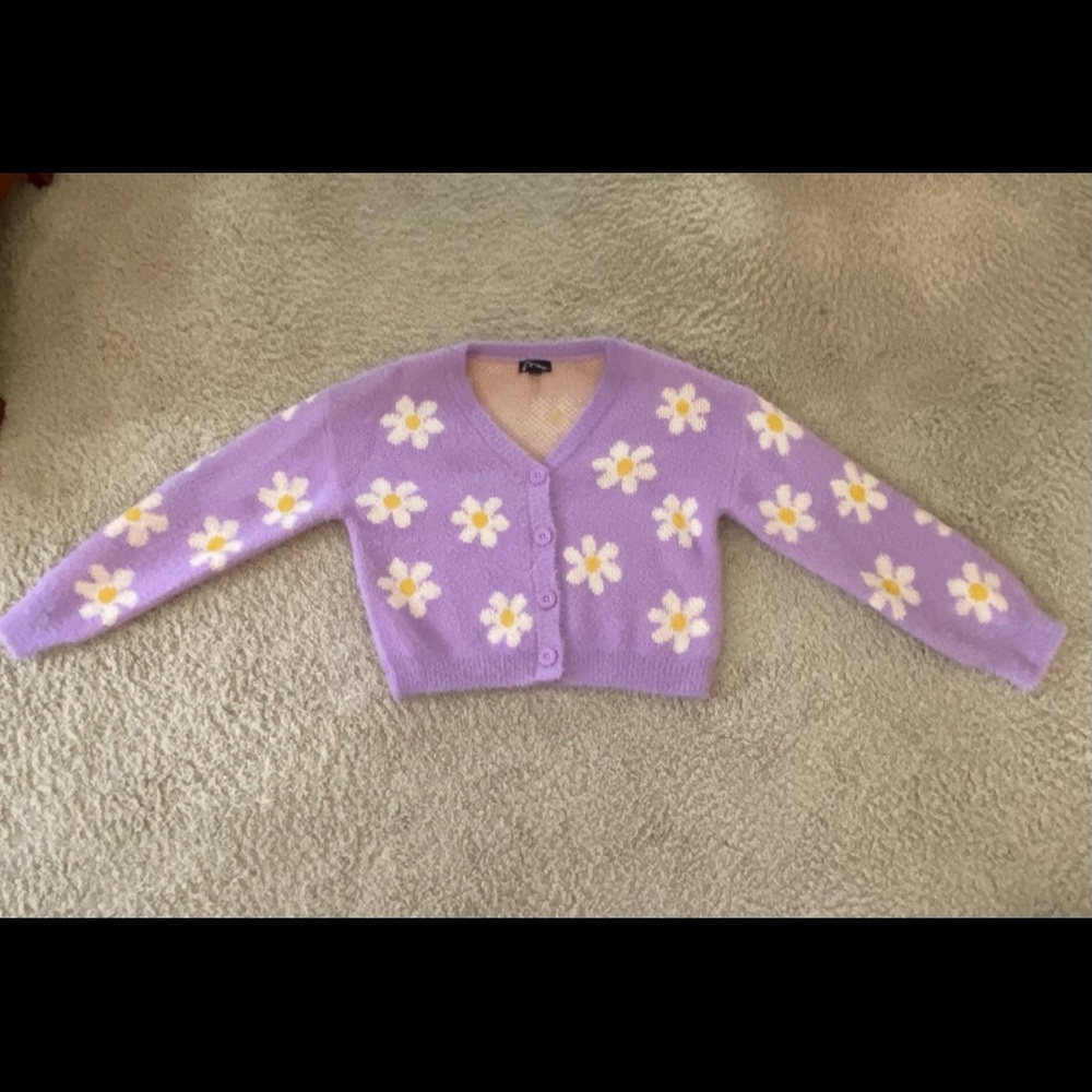 It’s super soft and very comfortable. Never wore it because it was too small.